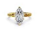 Yellow gold Marquise Solitaire Diamond Engagement Ring with XO Engraved Band and Four-Prong Setting