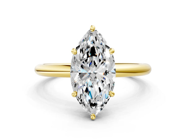 Yellow gold Marquise Solitaire Diamond Ring with Four-Prong Setting on a Plain Band