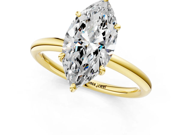 Yellow gold Marquise Solitaire Diamond Ring with Four-Prong Setting on a Plain Band