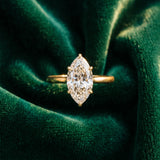 Yellow gold Marquise Solitaire Diamond Ring with Four-Prong Setting on a Plain Band_35