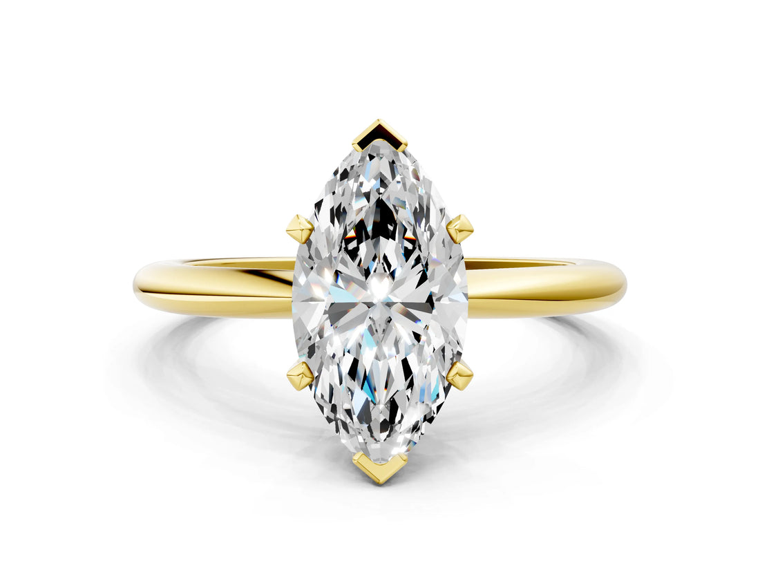 Yellow gold Marquise Solitaire Diamond Ring with Six-Prong Setting on a Classic Band