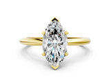 Yellow gold Marquise Solitaire Diamond Ring with Six-Prong Setting on a Classic Band