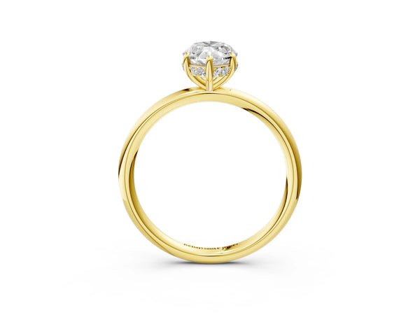 Yellow gold Marquise Solitaire Diamond Ring with a Classic Band and Four-Prong Setting
