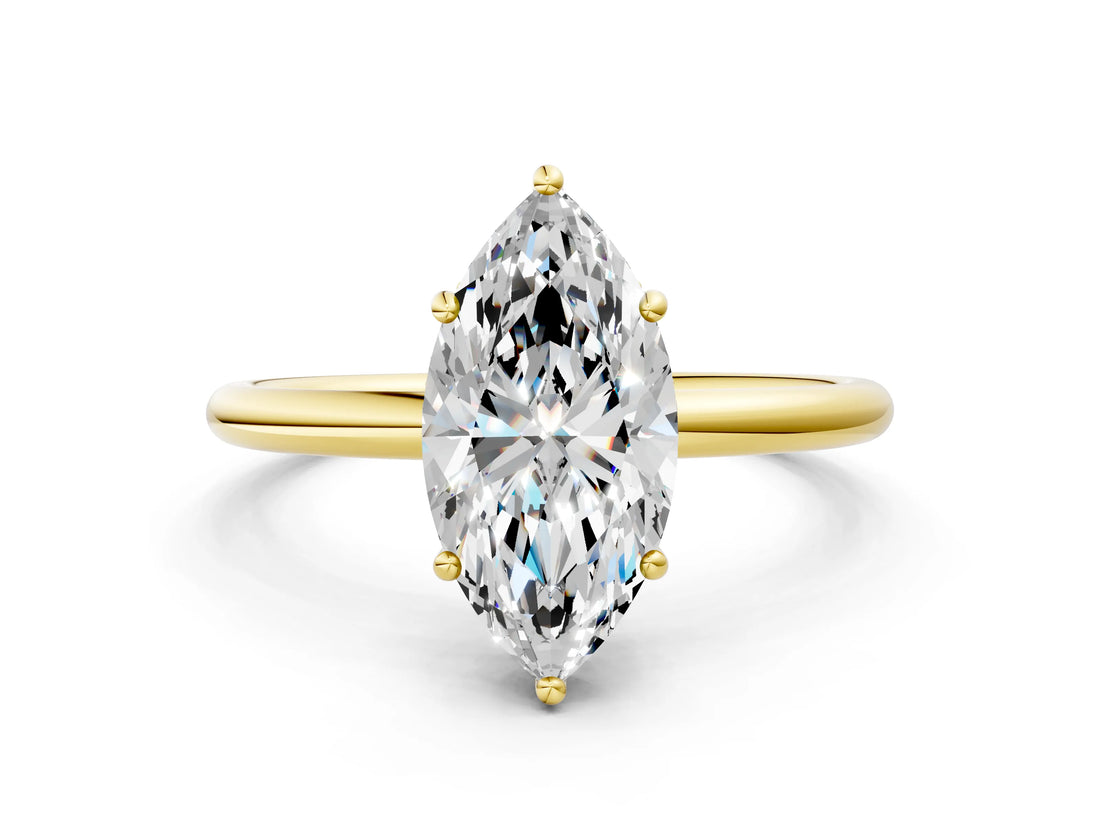 Yellow gold Marquise Solitaire Diamond Ring with a Classic Band and Four-Prong Setting