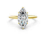 Yellow gold Marquise Solitaire Diamond Ring with a Classic Band and Four-Prong Setting