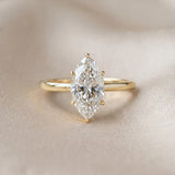 Yellow gold Marquise Solitaire Engagement Ring with Cathedral Band and Four-Prong Setting_60
