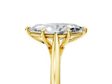 Yellow gold Marquise Solitaire Engagement Ring with Four-Prong Setting and Classic Band