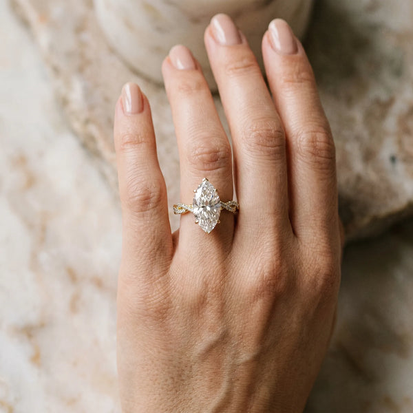Yellow gold Marquise Solitaire Twisted Pave Band with Four-Prong Setting