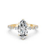 10K Yellow Gold 4.03 Carat E VVS2 Marquise Solitaire with Side Stones on a Pavé Band and Four-Prong Setting