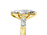 Yellow gold Marquise Solitaire with Tapered Baguette Side Stones on a Classic Band with Four-Prong Setting_136