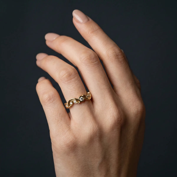 Yellow gold Marquise and Round Diamond Infinity Eternity Band with Bezel Setting