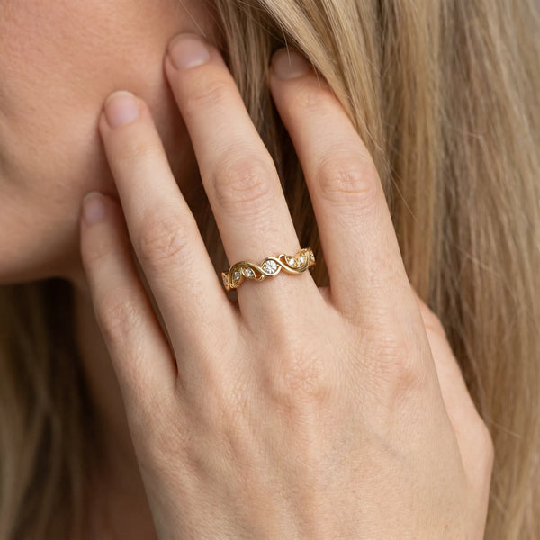 Yellow gold Marquise and Round Diamond Infinity Eternity Band with Bezel Setting