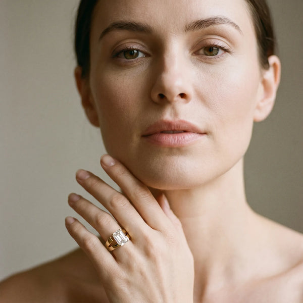 Yellow gold Modern Tension Set Emerald Cut Diamond Solitaire Wide Band Ring