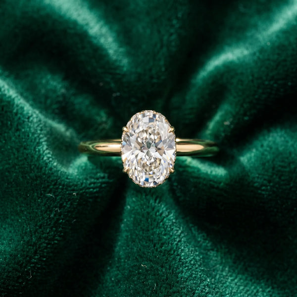 Yellow gold Oval Brilliant Solitaire Engagement Ring with Six-Prong Setting and Classic Band