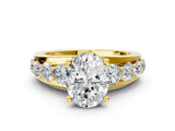 Yellow gold Oval Brilliant Solitaire with Side Stones on a Pave Band and Four-Prong Setting_24