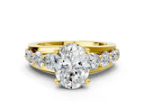 Yellow gold Oval Brilliant Solitaire with Side Stones on a Pave Band and Four-Prong Setting_47