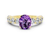 Yellow gold Oval Cut Amethyst Prong Setting with Side Stones on a Pave Band