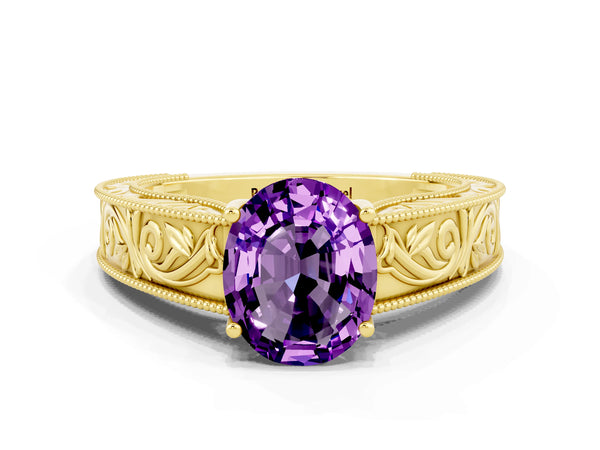 Yellow gold Oval Cut Amethyst Solitaire Ring with Engraved Band and Four-Prong Setting