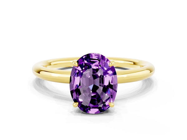Yellow gold Oval Cut Amethyst Solitaire Ring with Thin Band and Four-Prong Setting