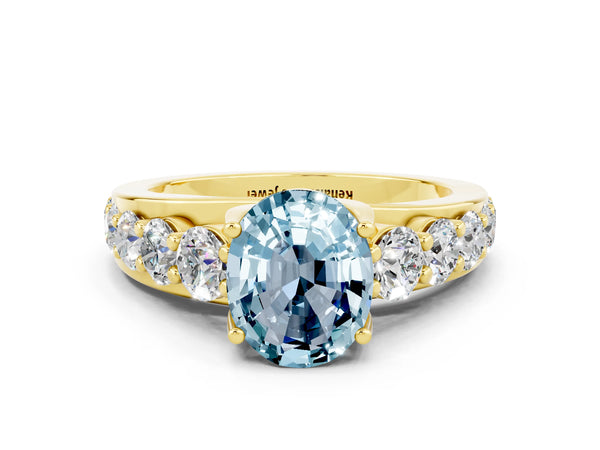 Yellow gold Oval Cut Aquamarine Engagement Ring with Pavé Band and Four-Prong Setting