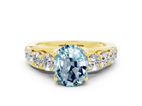Yellow gold Oval Cut Aquamarine Engagement Ring with Pavé Band and Four-Prong Setting