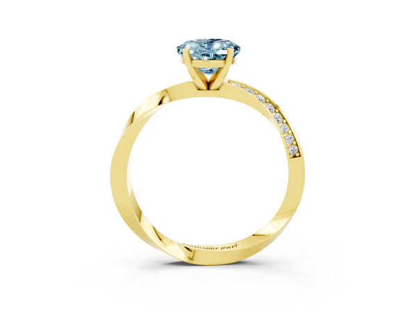 Yellow gold Oval Cut Aquamarine Engagement Ring with Side Stone Accents and Four-Prong Setting