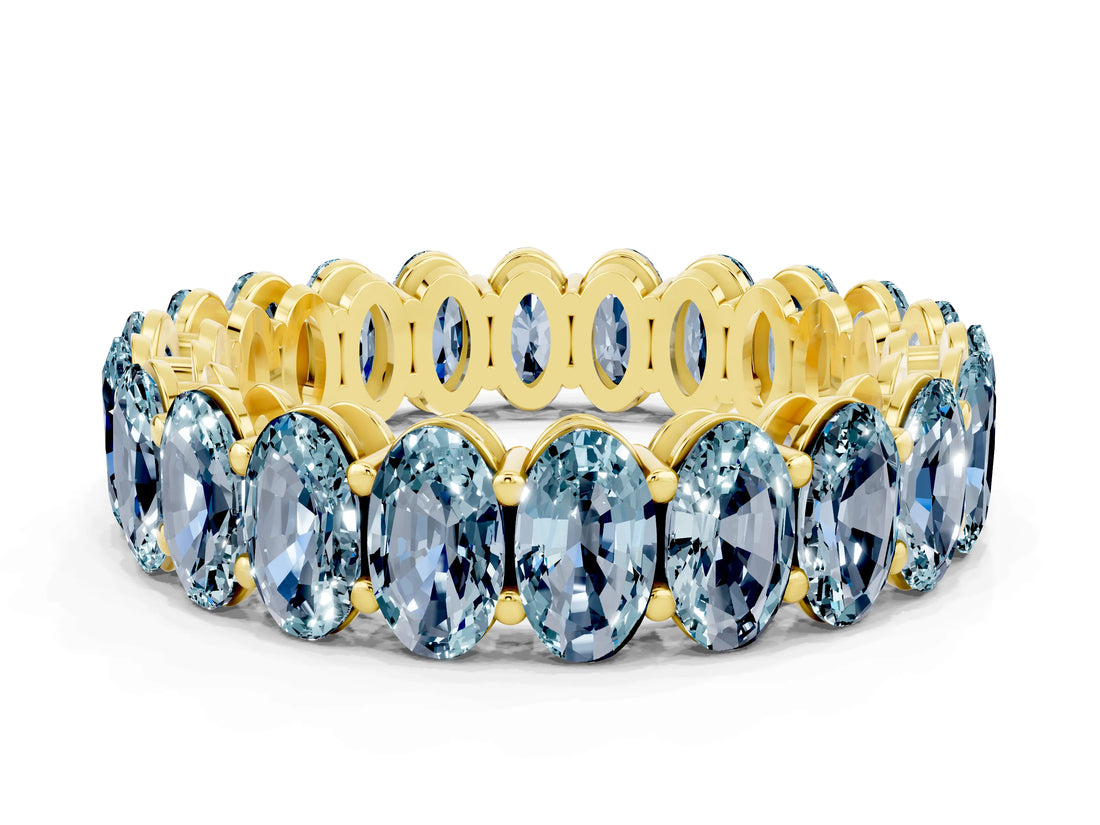 Yellow gold Oval Cut Aquamarine Eternity Band with Shared Prong Setting