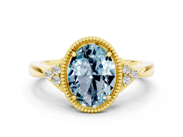 Yellow gold Oval Cut Aquamarine Halo Ring with Tapered Band and Four-Prong Setting