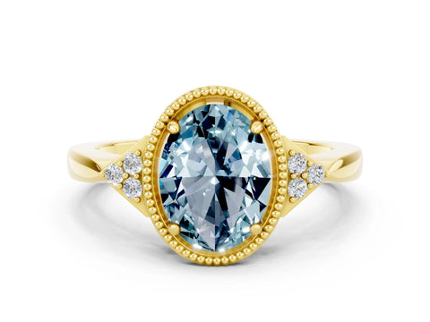 Yellow gold Oval Cut Aquamarine Halo Ring with Tapered Band and Four-Prong Setting