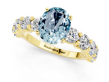 Yellow gold Oval Cut Aquamarine Prong Setting with Side Stones on a Pave Band_1