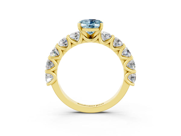 Yellow gold Oval Cut Aquamarine Prong Setting with Side Stones on a Pave Band