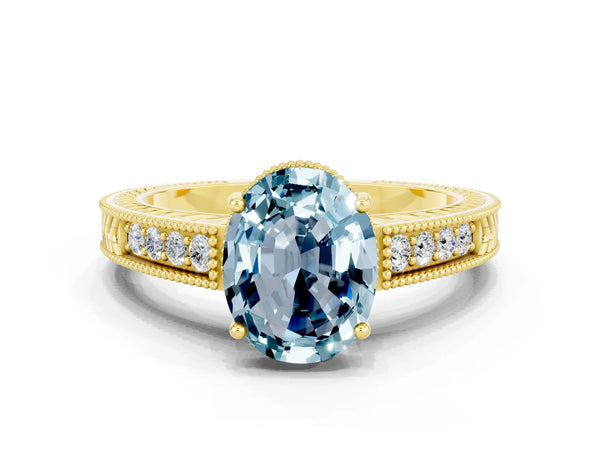 Yellow gold Oval Cut Aquamarine Ring with Milgrain Pavé Band and Four-Prong Setting