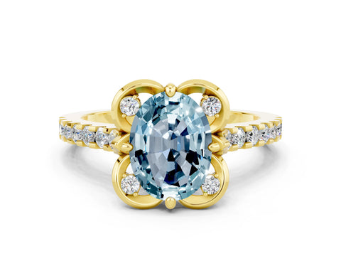 Yellow gold Oval Cut Aquamarine Ring with Pavé Band and Floral Prong Setting