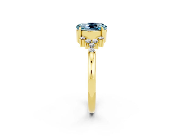 Yellow gold Oval Cut Aquamarine Ring with Side Stones and Four-Prong Setting
