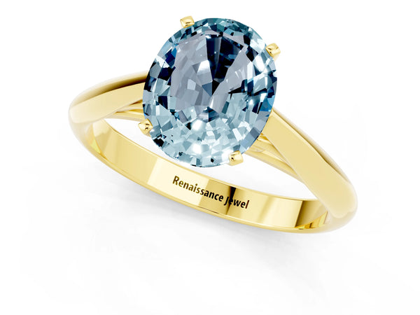Yellow gold Oval Cut Aquamarine Solitaire Engagement Ring with Cathedral Setting and Four-Prong Mount