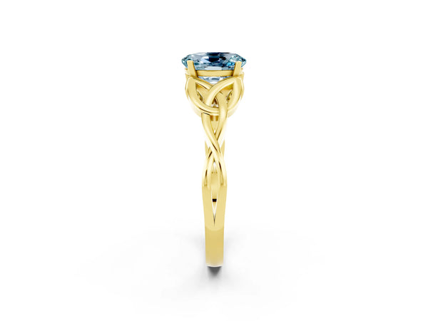 Yellow gold Oval Cut Aquamarine Solitaire Engagement Ring with Celtic Knot Band and Four-Prong Setting