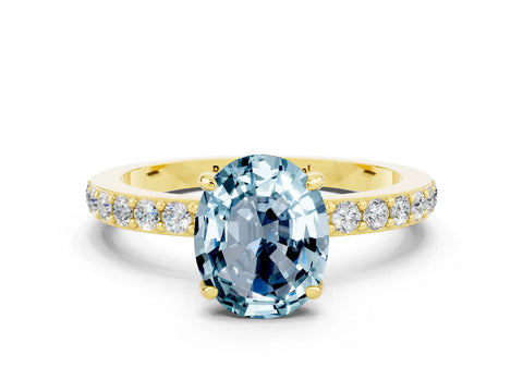 Yellow gold Oval Cut Aquamarine Solitaire Engagement Ring with Pavé Band and Four-Prong Setting