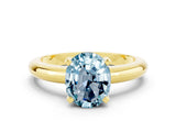 Yellow gold Oval Cut Aquamarine Solitaire Engagement Ring with Round Band and Four-Prong Setting