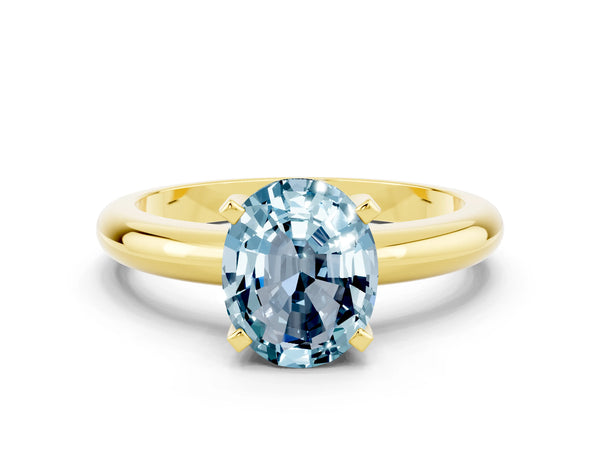 Yellow gold Oval Cut Aquamarine Solitaire Engagement Ring with Round Band and Four-Prong Setting