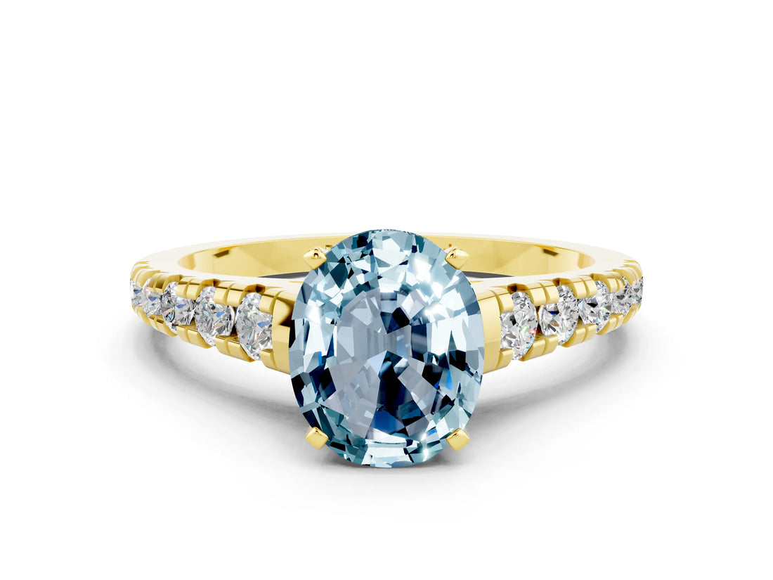 Yellow gold Oval Cut Aquamarine Solitaire Ring with Cathedral Setting and Pavé Band