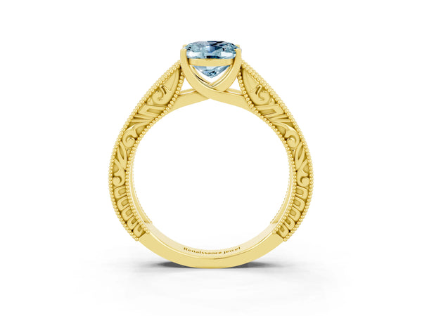 Yellow gold Oval Cut Aquamarine Solitaire Ring with Engraved Band and Four-Prong Setting