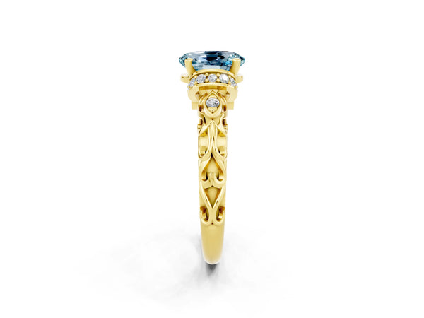 Yellow gold Oval Cut Aquamarine Solitaire Ring with Filigree Band and Four-Prong Setting