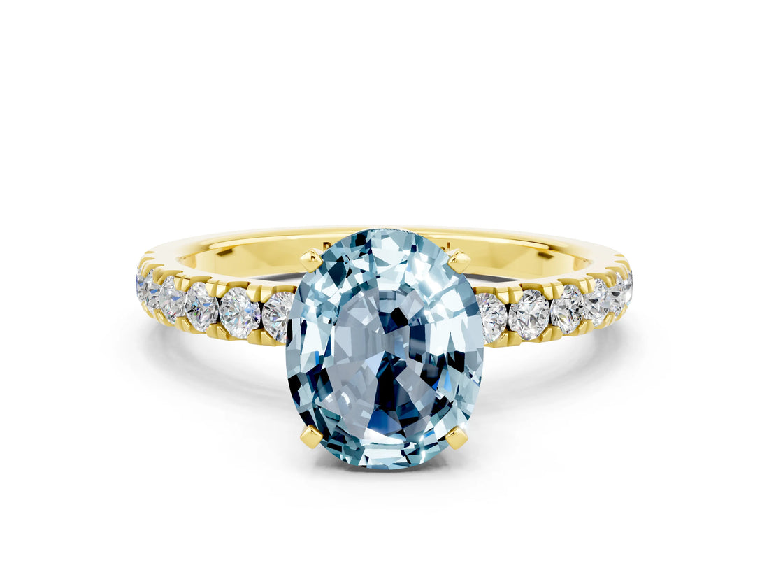 Yellow gold Oval Cut Aquamarine Solitaire Ring with Pavé Accents and Four-Prong Setting