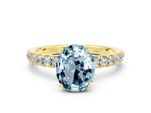 Yellow gold Oval Cut Aquamarine Solitaire Ring with Pavé Accents and Four-Prong Setting