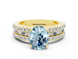 Yellow gold Oval Cut Aquamarine Solitaire Ring with Pavé and Channel Set Band