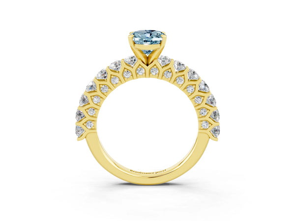 Yellow gold Oval Cut Aquamarine Solitaire Ring with Shared Prong Pavé Band and Four-Prong Setting