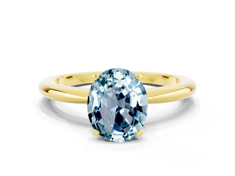 Yellow gold Oval Cut Aquamarine Solitaire Ring with Six-Prong Setting and Classic Band