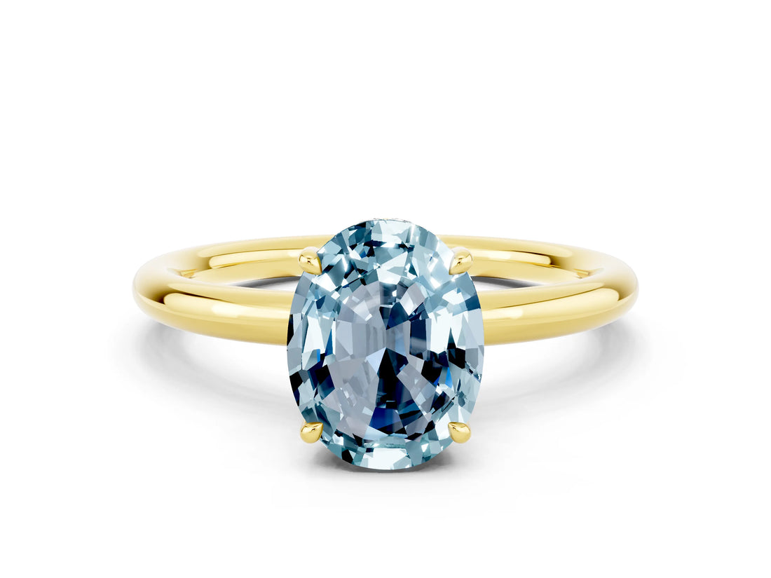 Yellow gold Oval Cut Aquamarine Solitaire Ring with Thin Band and Four-Prong Setting_12
