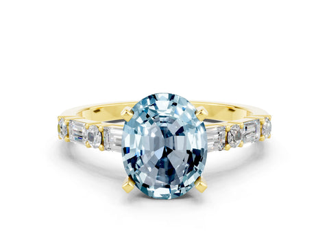 Yellow gold Oval Cut Aquamarine Solitaire with Side Baguettes and Channel Set Band