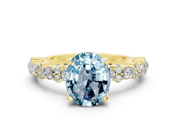 Yellow gold Oval Cut Aquamarine Side Stone Solitaire Ring with Round  and Four-Prong Setting